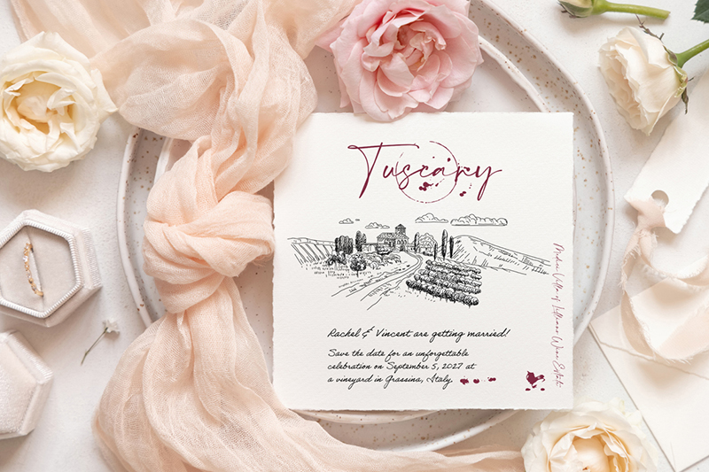 Custom Tuscany destination wedding save-the-date card featuring a vineyard illustration and calligraphy fonts